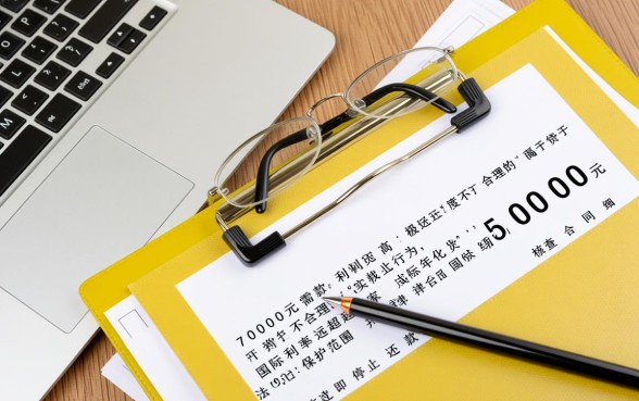 分期乐借了7000要还15000合理吗，这种利息受法律保护吗